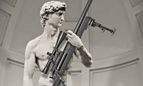 David holding an AR-50A1 rifle Photo via The Guardian -: Franco Visintainer/ANSA